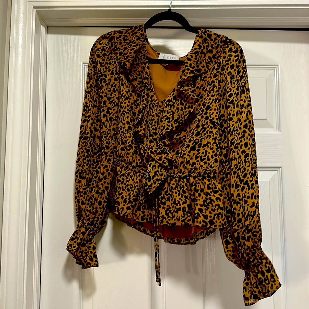 Cheetah ruffle v neck blouse